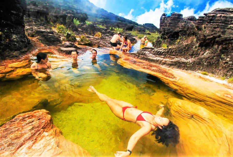 On the peak of the plateau there are natural pools with the bottom covered with rock crystal, Caracas