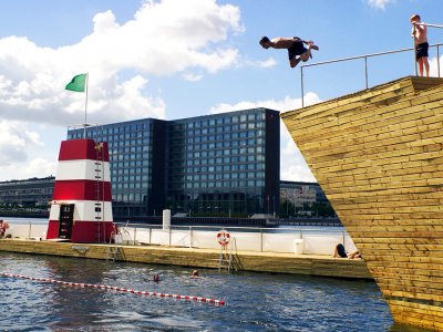 Jump into outdoor pool in Copenhagen