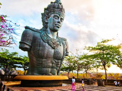 Take a pic next to the huge statue of Vishnu in Bali