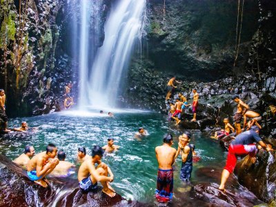 Take a swim under 40-meter-high waterfall in Bali