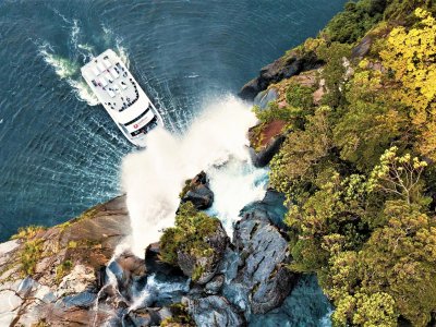 Go under a fjord waterfall on a ship board in Queenstown