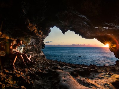Watch the sunset from the cave on Easter Island