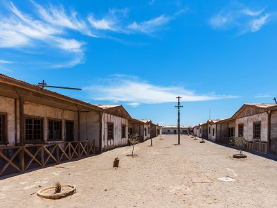 Wander around a ghost town's streets in Iquique