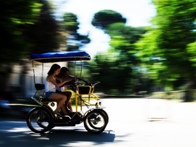 Explore Villa Borghese in the quadricycle in Rome
