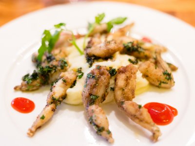 Try frog legs dish in Paris