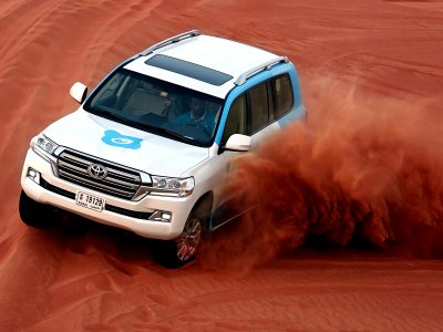 Evening Red-Dunes Desert Safari Dubai: Dune bashing-BBQ-Falcon & Sandboarding